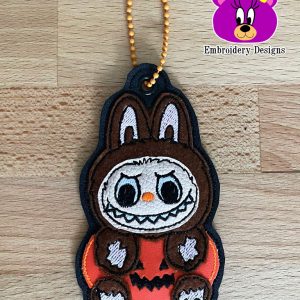 La Halloween eyelet and snap tab