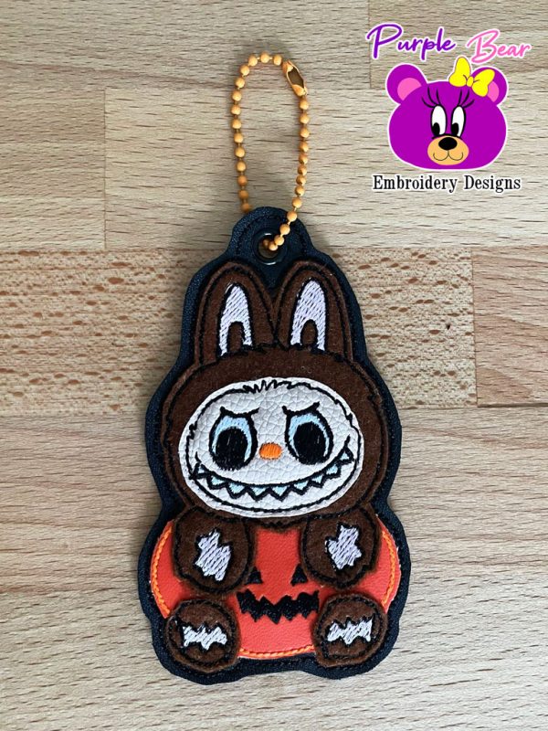 La Halloween eyelet and snap tab